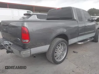 2003 Ford F-150 XL with VIN 1FTRX17W93NB63496, listed as a IAAI auction lot 42406687 with Not provided miles and . Bid and sale history available at DreamBid. Image 4.