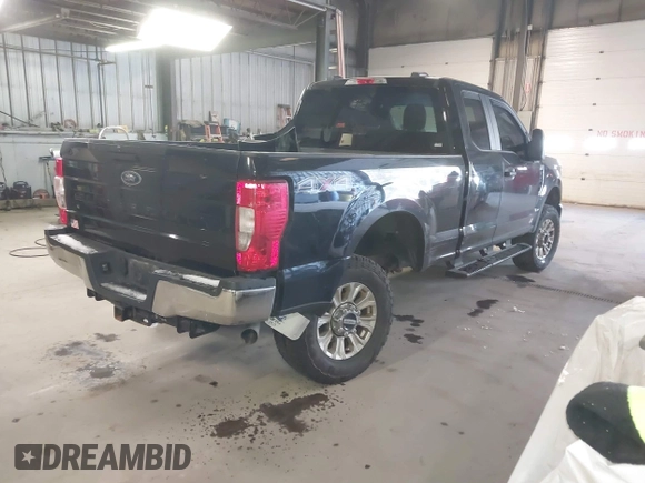 2021 Ford Super Duty F-250 SRW XL with VIN 1FT7X2B63MED51503, listed as a IAAI auction lot 41227248 with 106,780 mi miles. Bid and sale history available at carsss.com. Image 4.