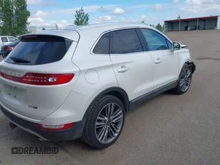 2016 Lincoln MKC Reserve with VIN 5LMTJ3DH1GUJ12829, listed as a IAAI auction lot 42370899 with 123,980 mi miles and . Bid and sale history available at DreamBid. Image 4.