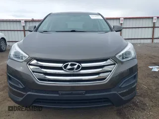 2014 Hyundai Santa Fe z VIN 5XYZTDLB1EG144290, wystawiony jako IAAI lot #42126367 z przebiegiem 138 525 mil mil oraz . Historia ofert i sprzedaży dostępna na DreamBid. Obrazek 12.