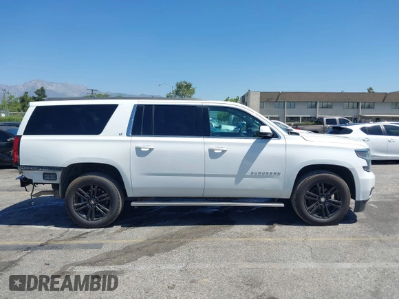 2017 Chevrolet Suburban LT z VIN 1GNSKHKC7HR325641, wystawiony jako IAAI lot #42290768 z przebiegiem 91 802 mil mil oraz . Historia ofert i sprzedaży dostępna na DreamBid. Obrazek 14.