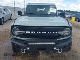 2021 Ford Bronco with VIN 1FMEE5DP6MLA61655, listed as a IAAI auction lot 42492762 with 88,313 mi miles and . Bid and sale history available at DreamBid. Image 12.