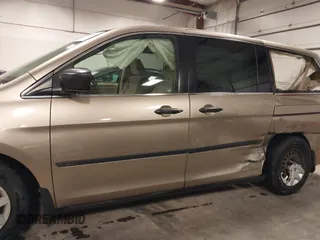 2006 Honda Odyssey LX with VIN 5FNRL38256B113667, listed as a IAAI auction lot 41856860 with 142,031 mi miles. Bid and sale history available at carsss.com. Image 15.