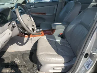 2002 Toyota Camry XLE z VIN 4T1BF32K22U532171, wystawiony jako Copart lot #54527965 z przebiegiem 165 637 mil mil oraz Szkoda całkowita • Salvage title. Historia ofert i sprzedaży dostępna na DreamBid. Obrazek 7.