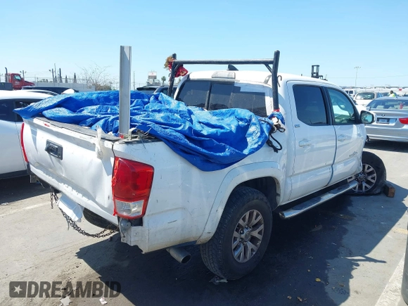 2016 Toyota Tacoma SR5 with VIN 5TFAX5GN8GX053836, listed as a IAAI auction lot 41973740 with 191,653 mi miles. Bid and sale history available at carsss.com. Image 4.