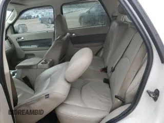 2009 Mercury Mariner Premier with VIN 4M2CU87G79KJ03236, listed as a Copart auction lot 84059324 with 130,335 mi miles and Salvage title. Bid and sale history available at DreamBid. Image 11.