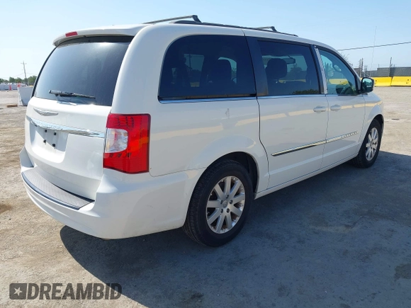 2013 Chrysler Town & Country Touring with VIN 2C4RC1BG4DR610462, listed as a IAAI auction lot 42173321 with 73,397 mi miles. Bid and sale history available at carsss.com. Image 4.