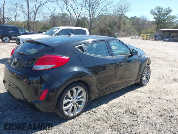 2013 Hyundai Veloster w/Gray Int with VIN KMHTC6AD9DU137473, listed as a IAAI auction lot 41846203 with 67,781 mi miles. Bid and sale history available at carsss.com. Image 4.