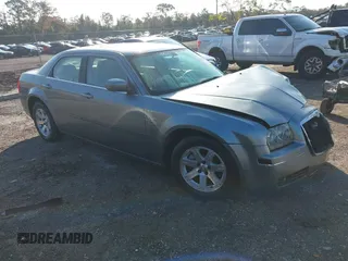 2007 Chrysler 300 Touring with VIN 2C3KA53G77H811283, listed as a IAAI auction lot 41315765 with 122,569 mi miles. Bid and sale history available at carsss.com. Image 1.