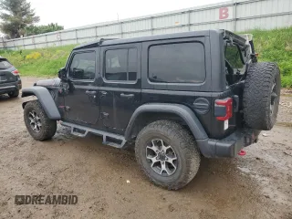 2021 Jeep Wrangler Unlimited Rubicon with VIN 1C4HJXFNXMW612186, listed as a Copart auction lot 56786665 with 52,379 mi miles and Salvage title. Bid and sale history available at DreamBid. Image 2.