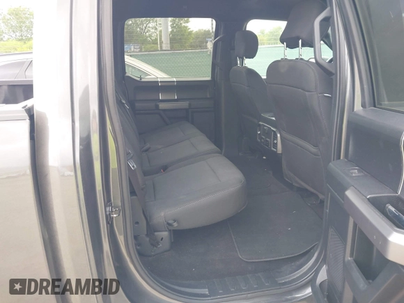 2020 Ford F-150 XL with VIN 1FTEW1E41LKE66857, listed as a IAAI auction lot 42041929 with 76,716 mi miles. Bid and sale history available at carsss.com. Image 8.