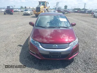 2011 Honda Insight LX z VIN JHMZE2H51BS004312, wystawiony jako IAAI lot #42086422 z przebiegiem 72 814 mil mil oraz . Historia ofert i sprzedaży dostępna na DreamBid. Obrazek 12.