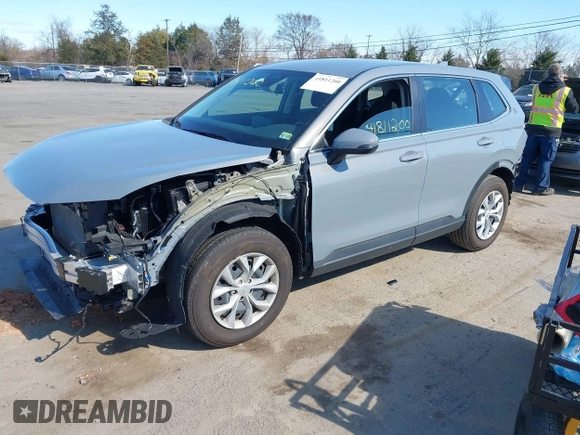 2024 Honda CR-V LX with VIN 2HKRS4H22RH420826, listed as a IAAI auction lot 41811200 with 14,515 mi miles and . Bid and sale history available at DreamBid. Image 2.