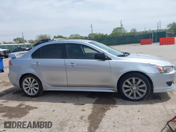 2008 Mitsubishi Lancer GTS with VIN JA3AU86U28U026507, listed as a IAAI auction lot 42033357 with 153,589 mi miles. Bid and sale history available at carsss.com. Image 13.