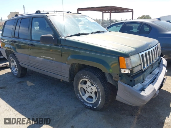 1996 Jeep Grand Cherokee Laredo with VIN 1J4GZ58S7TC280276, listed as a IAAI auction lot 42120454 with 230,617 mi miles. Bid and sale history available at carsss.com. Image 1.
