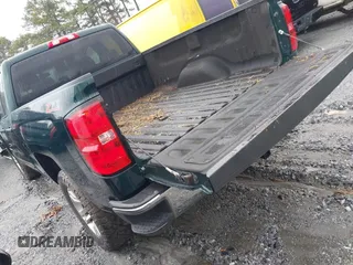 2015 Chevrolet Silverado 1500 LT with VIN 1GCRCREHXFZ267054, listed as a IAAI auction lot 41543297 with 134,087 mi miles. Bid and sale history available at carsss.com. Image 3.