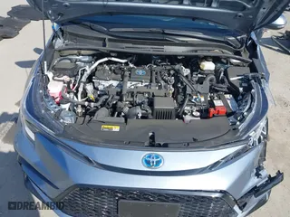 2024 Toyota Corolla Hybrid LE with VIN JTDBCMFE7RJ023311, listed as a IAAI auction lot 42051893 with 18,607 mi miles. Bid and sale history available at carsss.com. Image 10.