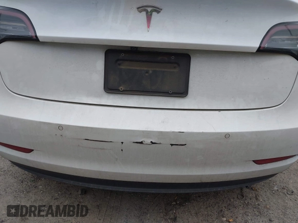 2020 Tesla Model 3 Standard Range Plus with VIN 5YJ3E1EA1LF799766, listed as a IAAI auction lot 41386508 with 90,000 mi miles. Bid and sale history available at carsss.com. Image 21.