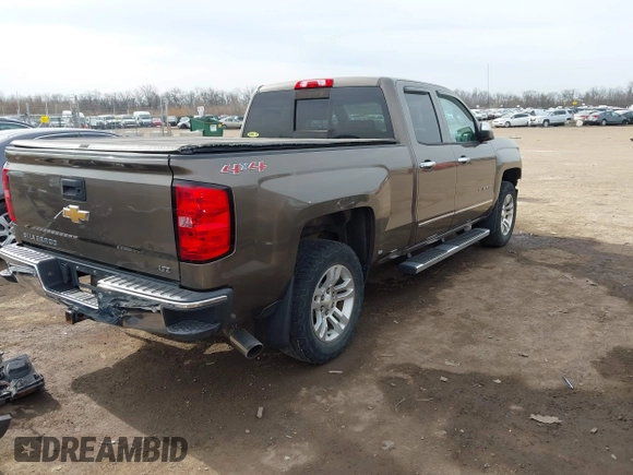 2014 Chevrolet Silverado 1500 LTZ with VIN 1GCVKSEC8EZ140508, listed as a IAAI auction lot 41821397 with 108,308 mi miles and . Bid and sale history available at DreamBid. Image 4.