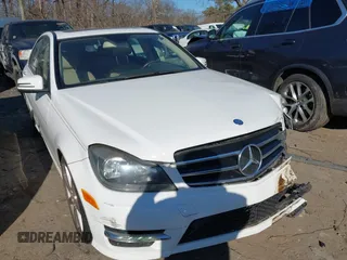 2014 Mercedes-Benz C C 250 Sport with VIN WDDGF4HB3EA963847, listed as a IAAI auction lot 41445657 with 107,457 mi miles. Bid and sale history available at carsss.com. Image 1.