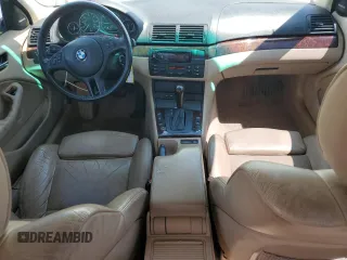 2005 BMW 3 Series 330i with VIN WBAEV53455KM41084, listed as a Copart auction lot 50338425 with 223,116 mi miles and Salvage title. Bid and sale history available at DreamBid. Image 8.
