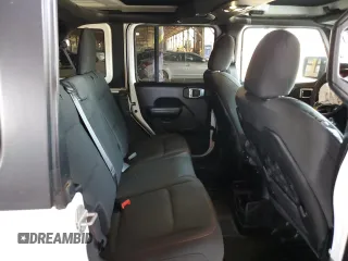 2021 Jeep Wrangler Unlimited Rubicon z VIN 1C4JJXFG5MW767036, wystawiony jako Copart lot #56918355 z przebiegiem 52 994 mil mil oraz Szkoda całkowita • Salvage title. Historia ofert i sprzedaży dostępna na DreamBid. Obrazek 10.