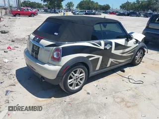 2015 MINI Convertible with VIN WMWZN3C53FT861968, listed as a IAAI auction lot 42717485 with 79,840 mi miles and . Bid and sale history available at DreamBid. Image 4.