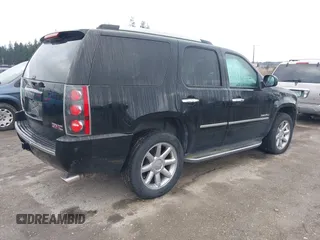 2011 GMC Yukon Denali with VIN 1GKS2EEF9BR261336, listed as a IAAI auction lot 41796533 with 149,808 mi miles. Bid and sale history available at carsss.com. Image 4.