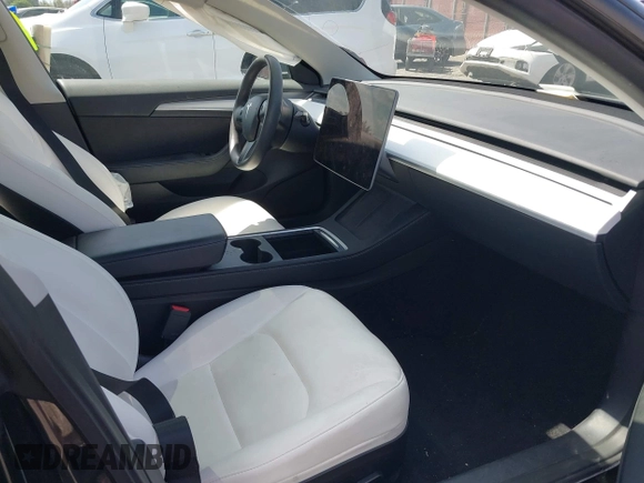 2022 Tesla Model 3 with VIN 5YJ3E1EA4NF316127, listed as a IAAI auction lot 41939191 with 30,857 mi miles. Bid and sale history available at carsss.com. Image 5.