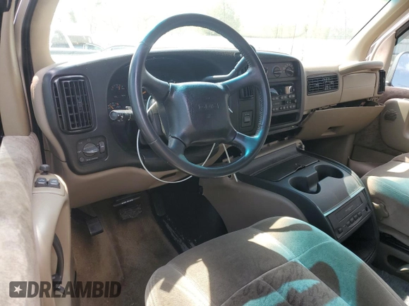 2002 GMC Savana z VIN 1GDFG65R221108418, wystawiony jako Copart lot #51793385 z przebiegiem 150 466 mil mil oraz Szkoda całkowita • Salvage title. Historia ofert i sprzedaży dostępna na DreamBid. Obrazek 8.
