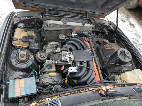 1989 BMW 3 Series z VIN WBAAE0302KED52374, wystawiony jako Copart lot #88331485 z przebiegiem Nie podano mil oraz Szkoda całkowita • Salvage title. Historia ofert i sprzedaży dostępna na DreamBid. Obrazek 11.