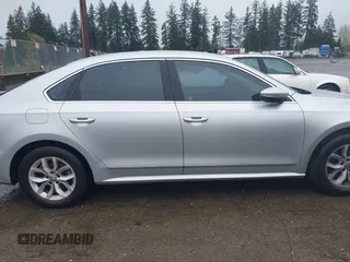 2016 Volkswagen Passat 1.8T S with VIN 1VWAT7A36GC050730, listed as a IAAI auction lot 41980031 with 134,080 mi miles. Bid and sale history available at carsss.com. Image 13.