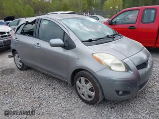 2010 Toyota Yaris with VIN JTDKT4K38A5296999, listed as a IAAI auction lot 41878127 with 122,692 mi miles. Bid and sale history available at carsss.com. Image 1.