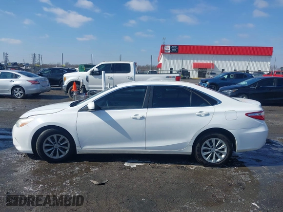 2016 Toyota Camry XLE with VIN 4T1BF1FK1GU155709, listed as a IAAI auction lot 41556465 with 159,923 mi miles and . Bid and sale history available at DreamBid. Image 14.