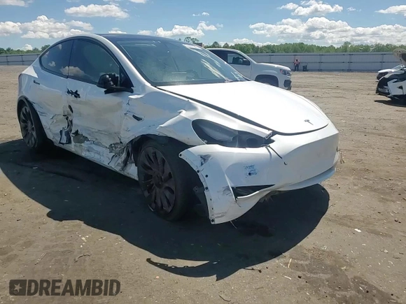 2022 Tesla Model Y Performance with VIN 7SAYGDEF9NF372337, listed as a Copart auction lot 55889345 with 51,099 mi miles and Salvage title. Bid and sale history available at DreamBid. Image 13.