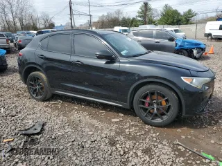 2019 Alfa Romeo Stelvio Ti with VIN ZASPAKBN3K7C55789, listed as a Copart auction lot 51557835 with 105,118 mi miles and Salvage title. Bid and sale history available at DreamBid. Image 4.