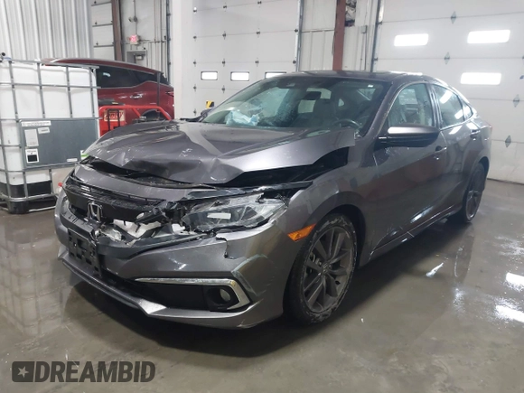 2020 Honda Civic EX-L with VIN 19XFC1F70LE010163, listed as a IAAI auction lot 41306532 with 88,767 mi miles and . Bid and sale history available at DreamBid. Image 17.