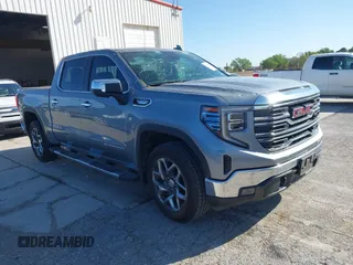 2023 GMC Sierra 1500 SLT z VIN 3GTUUDED8PG186014, wystawiony jako IAAI lot #41958136 z przebiegiem 46 766 mil mil oraz . Historia ofert i sprzedaży dostępna na DreamBid. Obrazek 1.