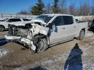 2023 GMC Sierra 1500 Denali Ultimate with VIN 1GTUUHEL0PZ312834, listed as a Copart auction lot 87369974 with 26,710 mi miles and Salvage Title. Bid and sale history available at carsss.com. Image 1.