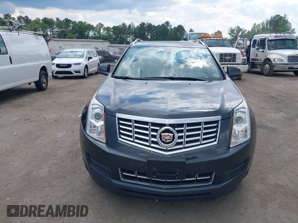 2014 Cadillac SRX Luxury Collection z VIN 3GYFNEE38ES626949, wystawiony jako IAAI lot #42194679 z przebiegiem 173 303 mil mil oraz . Historia ofert i sprzedaży dostępna na DreamBid. Obrazek 12.
