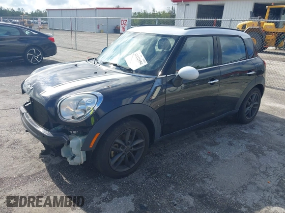 2013 MINI Countryman S with VIN WMWZC3C5XDWP24270, listed as a IAAI auction lot 42232550 with 95,512 mi miles and . Bid and sale history available at DreamBid. Image 2.