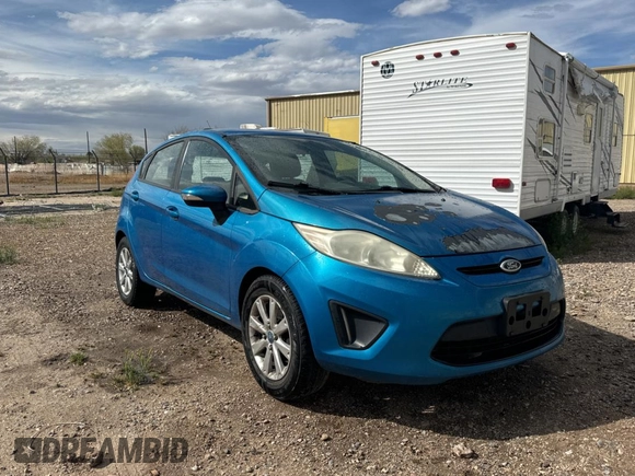2013 Ford Fiesta SE with VIN 3FADP4EJ0DM141097, listed as a Copart auction lot 51342175 with 146,316 mi miles and Clean Title. Bid and sale history available at carsss.com. Image 1.