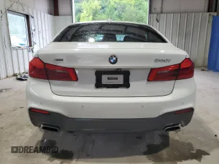 2018 BMW 5 Series 540i xDrive with VIN WBAJE7C53JWC54662, listed as a Copart auction lot 63703595 with 96,523 mi miles and Salvage title. Bid and sale history available at DreamBid. Image 6.