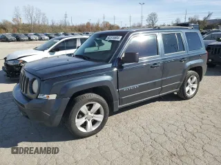2014 Jeep Patriot Latitude with VIN 1C4NJPFA7ED690406, listed as a Copart auction lot 82370804 with 173,228 mi miles and Salvage title. Bid and sale history available at DreamBid. Image 1.