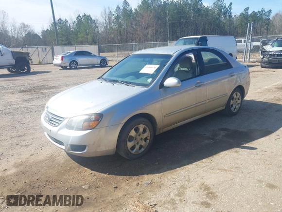 2009 Kia Spectra EX with VIN KNAFE221995647605, listed as a IAAI auction lot 41680420 with 169,000 mi miles. Bid and sale history available at carsss.com. Image 2.