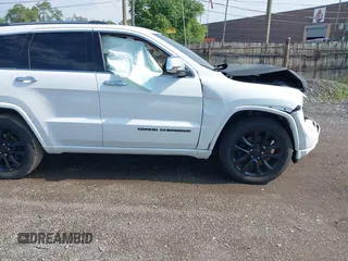 2017 Jeep Grand Cherokee Overland with VIN 1C4RJFCT6HC880306, listed as a IAAI auction lot 42534987 with 97,976 mi miles and . Bid and sale history available at DreamBid. Image 13.