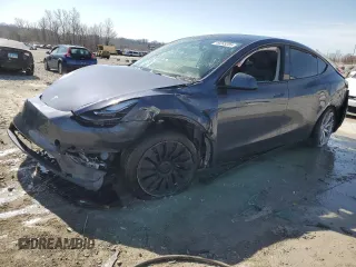 2023 Tesla Model Y Long Range z VIN 7SAYGDEE7PF822934, wystawiony jako Copart lot #49285285 z przebiegiem Nie podano mil oraz Szkody całkowita. Historia ofert i sprzedaży dostępna na DreamBid. Obrazek 1.