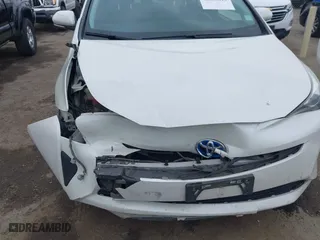 2016 Toyota Prius Two with VIN JTDKBRFU2G3503863, listed as a IAAI auction lot 42035013 with 118,930 mi miles. Bid and sale history available at carsss.com. Image 18.