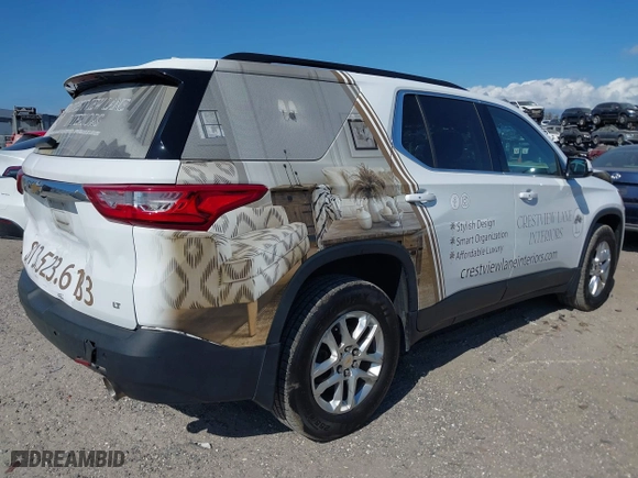 2019 Chevrolet Traverse LT Leather with VIN 1GNEVHKW2KJ306743, listed as a IAAI auction lot 41560538 with 132,641 mi miles. Bid and sale history available at carsss.com. Image 4.