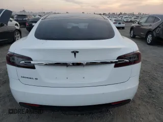 2016 Tesla Model S 70 kWh Battery with VIN 5YJSA1E19GF151945, listed as a Copart auction lot 83851454 with 74,473 mi miles and Non Repairable. Bid and sale history available at carsss.com. Image 6.